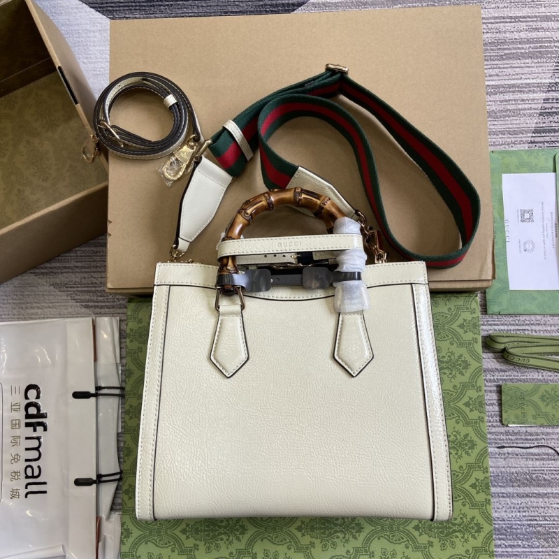 G*u*i top handle bags